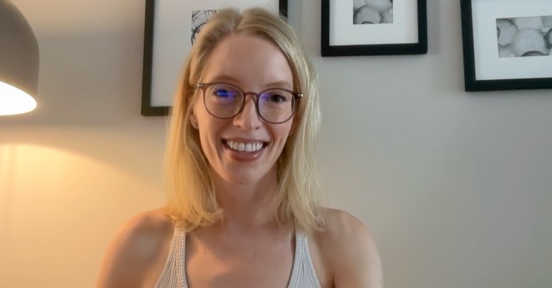 Kelsey on a video call, laughing